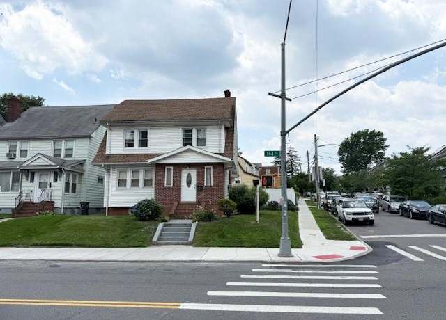 Property at 8456 164th St, Jamaica Estates, NY 11432, 5 beds, 3 baths