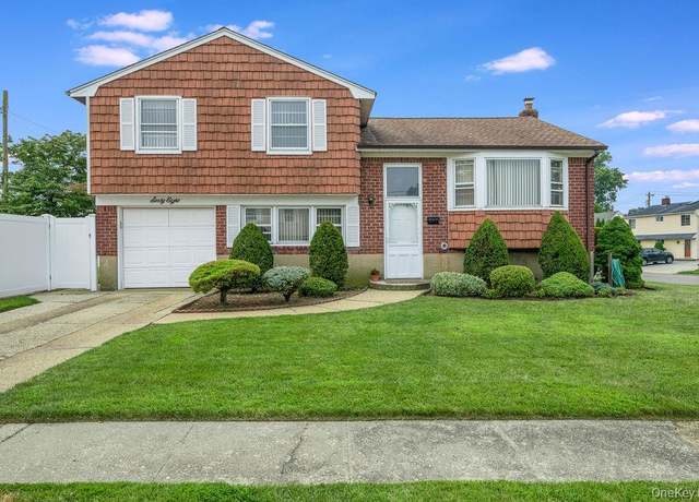Property at 68 Dante Ave, Hicksville, NY 11801, 4 beds, 2.5 baths