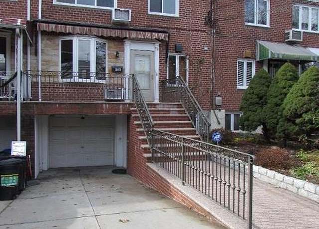 Property at 61-56 70th St, Middle Village, NY 11379, 4 beds, 2 baths