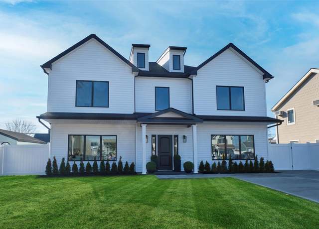 Property at 14 Lily Ln, Levittown, NY 11756, 5 beds, 3 baths