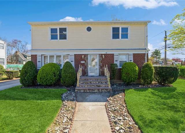 Property at 1377 D St, Elmont, NY 11003, 4 beds, 3 baths