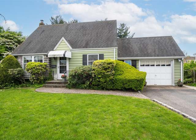 Property at 1025 Mirabelle Ave, Westbury, NY 11590, 4 beds, 2 baths