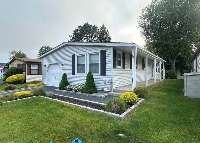 Property at 16 Village Cir E, Manorville, NY 11949, 2 beds, 2 baths