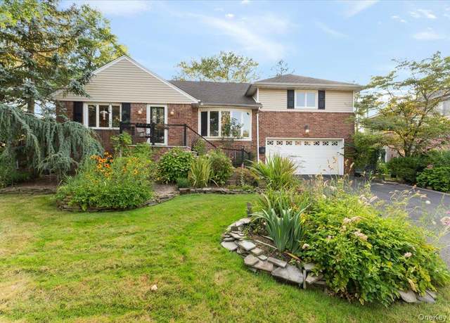 Property at 923 Woodmere Dr, Valley Stream, NY 11581, 6 beds, 3 baths