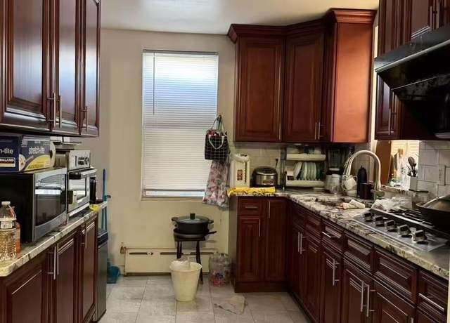 Property at 34-49 110th St, Corona, NY 11368, 4 beds, 2 baths