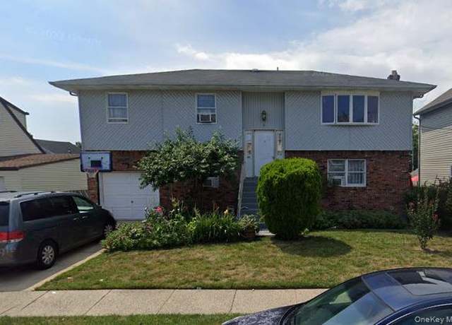 Property at 82 Oakley Ave, Elmont, NY 11003, 7 beds, 3 baths
