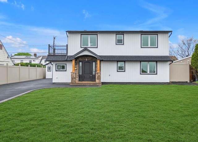 Property at 107 Abbey Ln, Levittown, NY 11756, 4 beds, 3 baths
