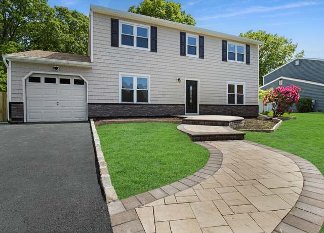 Property at 16 Sampson Ave, Islandia, NY 11749, 4 beds, 2.5 baths