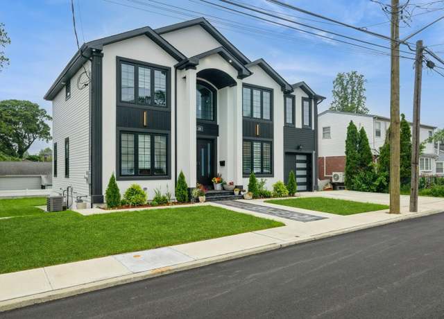 Property at 215 Marguerite Ave, South Floral Park, NY 11001, 4 beds, 3 baths