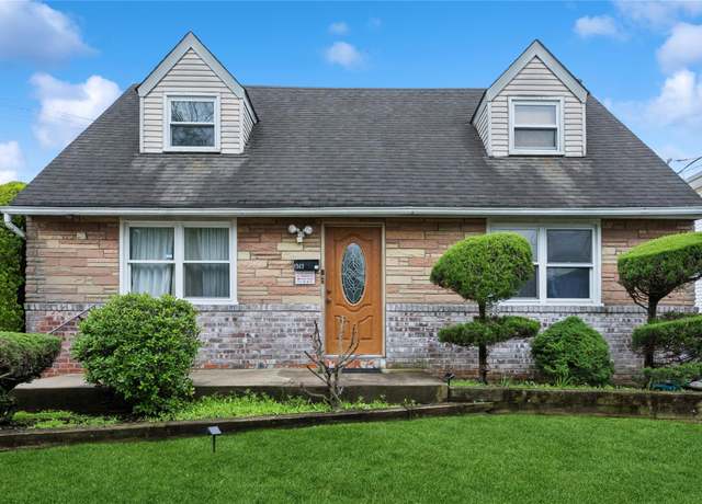 Property at 1343 E St, Elmont, NY 11003, 4 beds, 3 baths