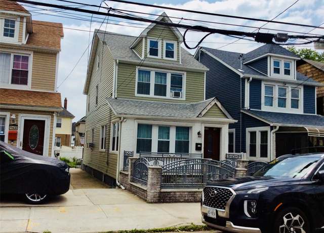 Property at 114-30 158th St, Jamaica, NY 11434, 4 beds, 3 baths