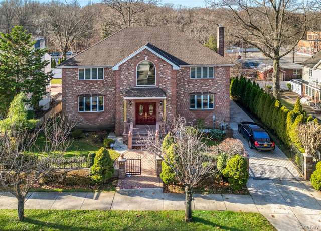 Property at 64-16 211th St, Bayside, NY 11364, 5 beds, 5 baths