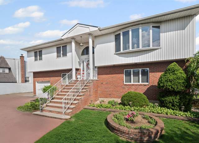 Property at 257 Franklin St, Elmont, NY 11003, 5 beds, 3 baths