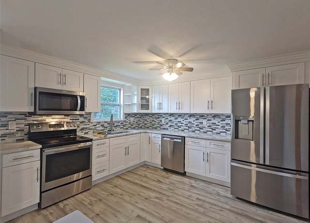 Property at 65 Biscayne Dr, Selden, NY 11784, 4 beds, 2 baths