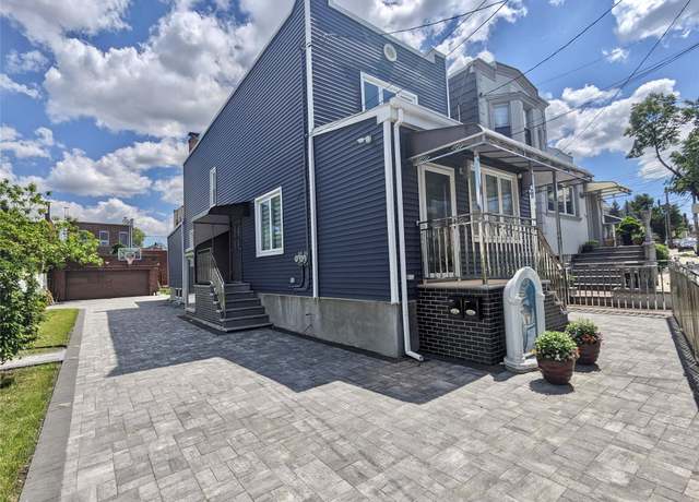 Property at 58-09 61 St, Maspeth, NY 11379, 3 beds, 3 baths