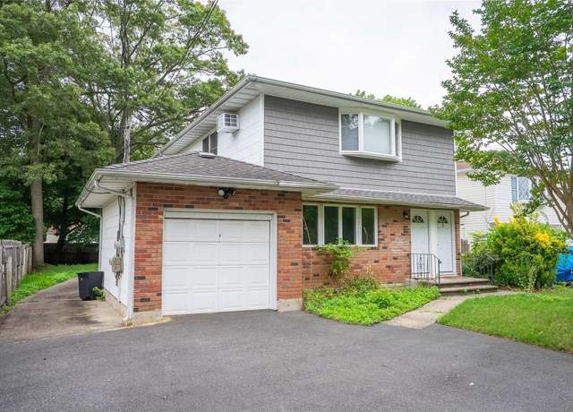 Property at 7 Miller Dr, Lake Grove, NY 11755, 5 beds, 2 baths