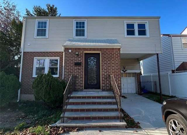 Property at 34 Diamond St, Elmont, NY 11003, 4 beds, 2.5 baths