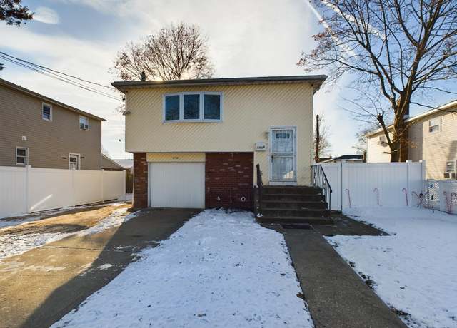 Property at 1036 Prospect Ave, Westbury, NY 11590, 5 beds, 2 baths
