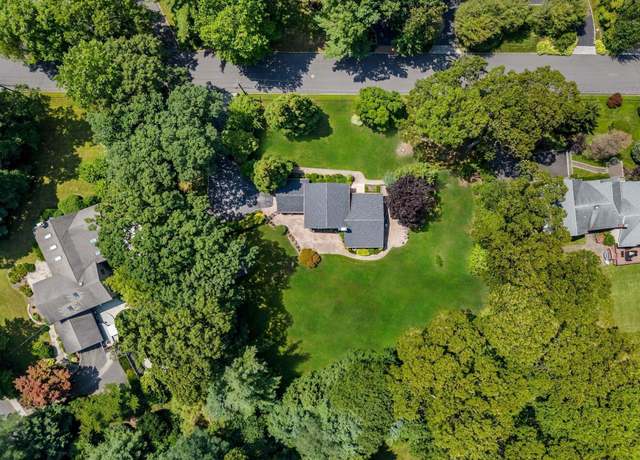 Property at 21 Kodiak Dr, Woodbury, NY 11797, 5 beds, 4 baths