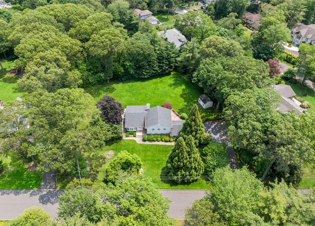 Property at 21 Kodiak Dr, Woodbury, NY 11797, 5 beds, 4 baths