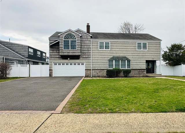 Property at 121 W Seaman Ave, Freeport, NY 11520, 5 beds, 2.5 baths
