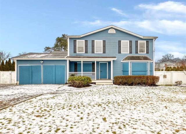 Property at 18 Lake Grove St, Centereach, NY 11720, 4 beds, 2.5 baths