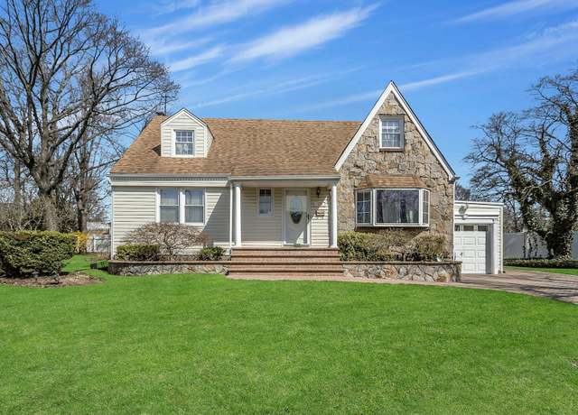 Property at 579 Dartmouth St, Westbury, NY 11590, 5 beds, 2 baths