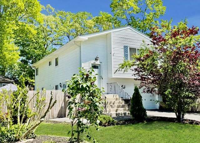 Property at 10 Brushwood Dr, Shirley, NY 11967, 4 beds, 2 baths