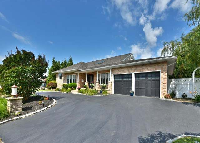 Property at 213 Harbor Ln, Massapequa Park, NY 11762, 5 beds, 3.5 baths