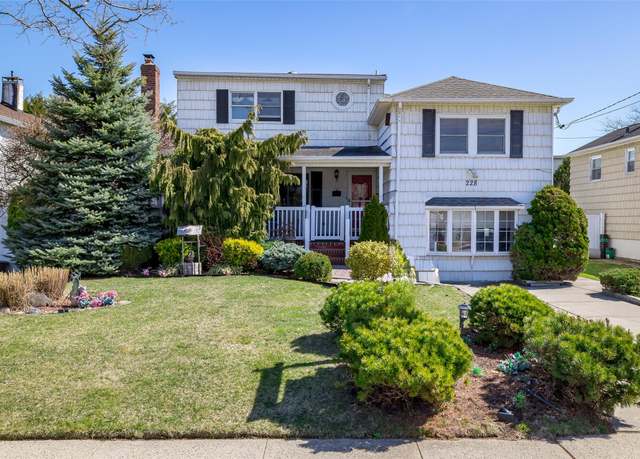 Property at 228 Mckinley Ave, Island Park, NY 11558, 3 beds, 2 baths