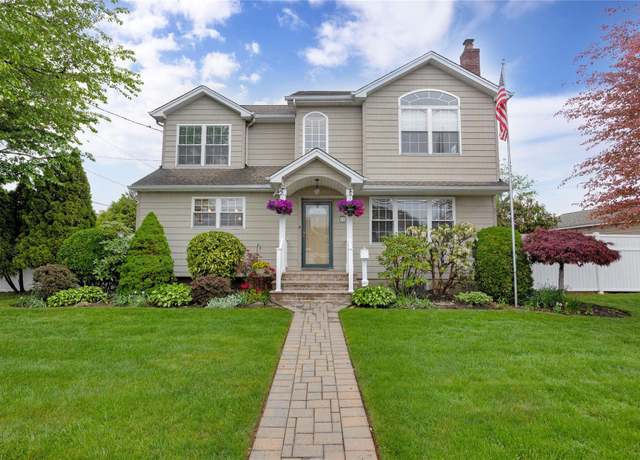 Property at 70 Pollok Pl, Hicksville, NY 11801, 4 beds, 2 baths