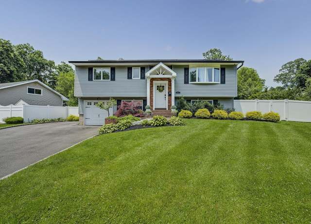 Property at 5 Somerset Dr, Commack, NY 11725, 4 beds, 2 baths