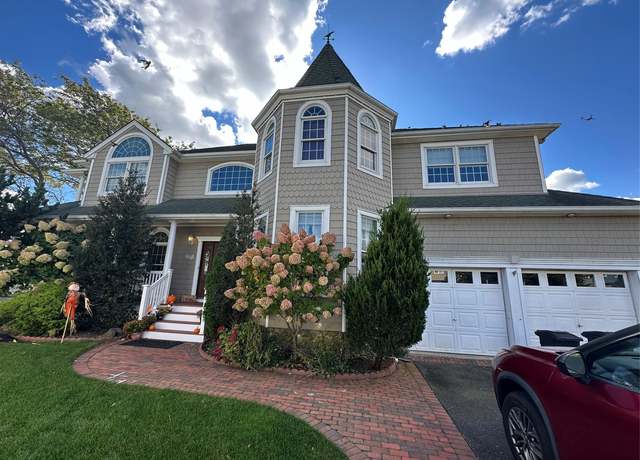 Property at 248 Delaware Ave, Island Park, NY 11558, 4 beds, 3.5 baths