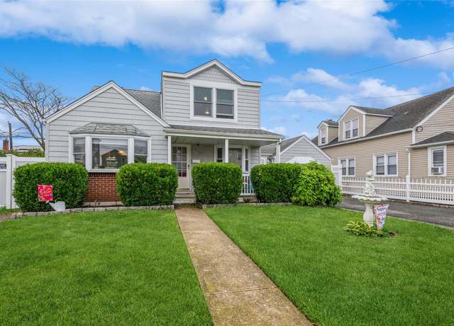 Property at 64 Kent Rd, Island Park, NY 11558, 5 beds, 3 baths