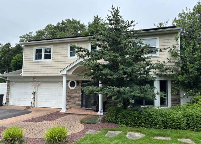 Property at 21 Tulipwood Dr, Commack, NY 11725, 4 beds, 2.5 baths