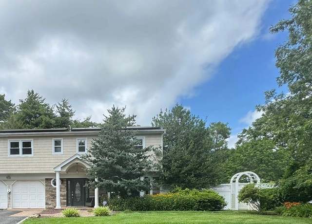 Property at 21 Tulipwood Dr, Commack, NY 11725, 4 beds, 2.5 baths