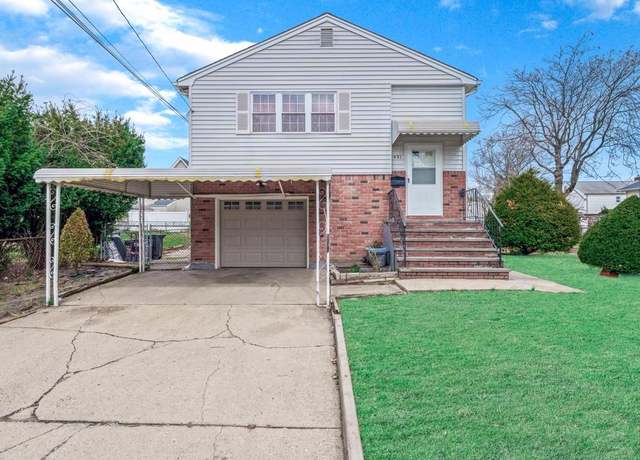 Property at 451 Dover St, Westbury, NY 11590, 5 beds, 2 baths