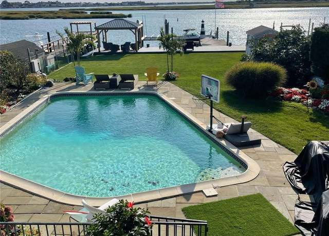 Property at 131 Island Pkwy, Island Park, NY 11558, 5 beds, 3 baths