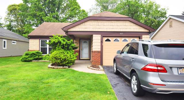 Photo of 407 Belfast Ln, Ridge, NY 11961