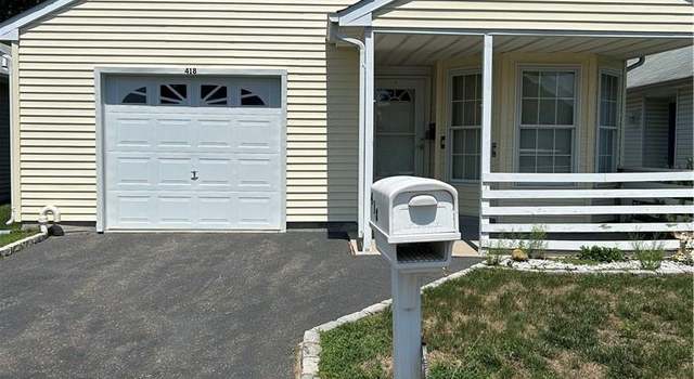 Photo of 418 Village Cir N, Manorville, NY 11949