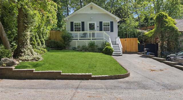 Photo of 32 Flowerfield Rd, Sound Beach, NY 11789