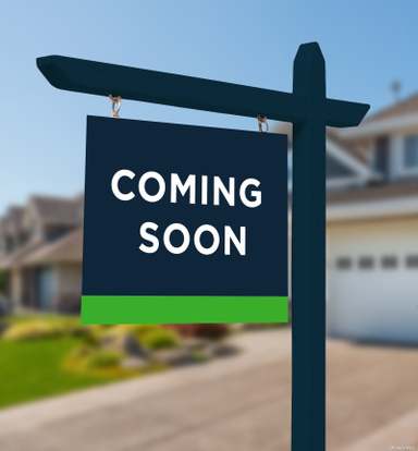 coming soon real estate sign