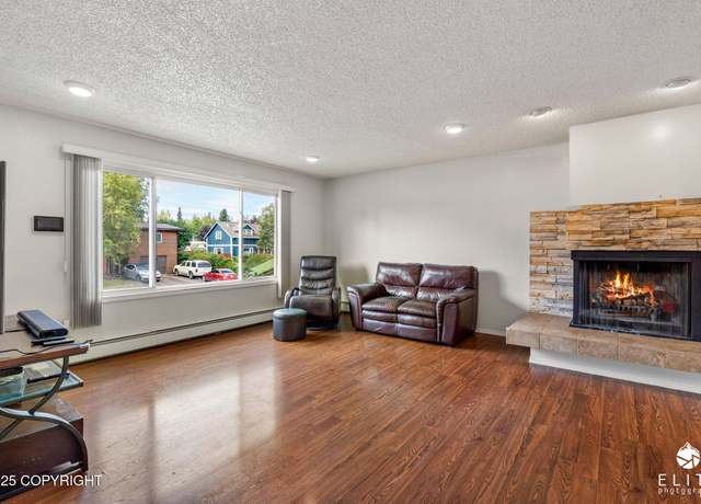Property at 8037 Wisteria St, Anchorage, AK 99502, 4 beds, 2.5 baths