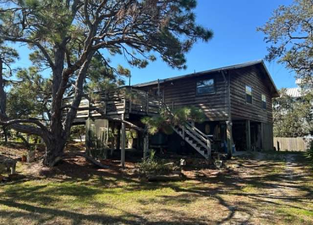 Property at 1057 W Pine Ave, St George Islan, FL 32328, 2 beds, 1 bath