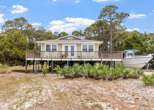 Property at 549 E Gulf Beach Dr, St George Islan, FL 32328, 4 beds, 2 baths
