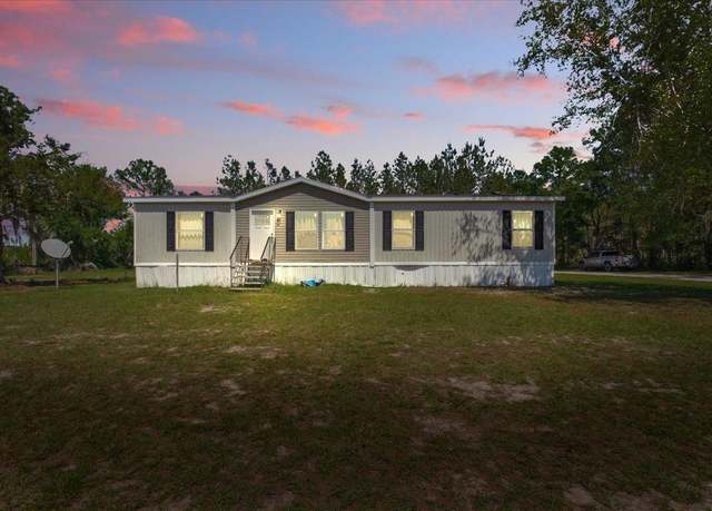 Property at 7480 Beach Rd, Perry, FL 32348, 4 beds, 2 baths