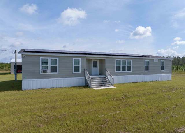 Property at 397 SE Schooner Way, Lee, FL 32059, 4 beds, 2 baths