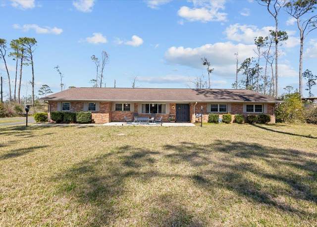 Property at 503 Plantation Rd, Perry, FL, 4 beds, 3.5 baths