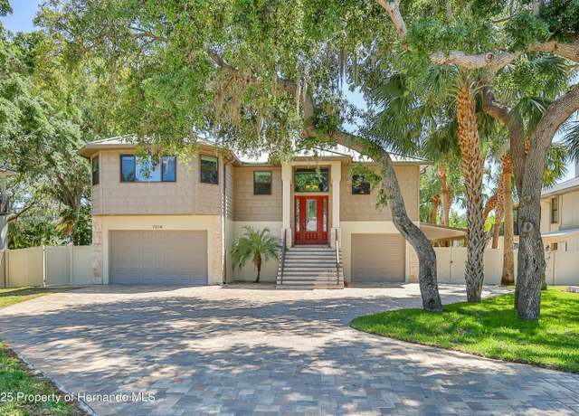 Property at 7106 Porpoise St, Weeki Wachee, FL 34607, 3 beds, 2 baths