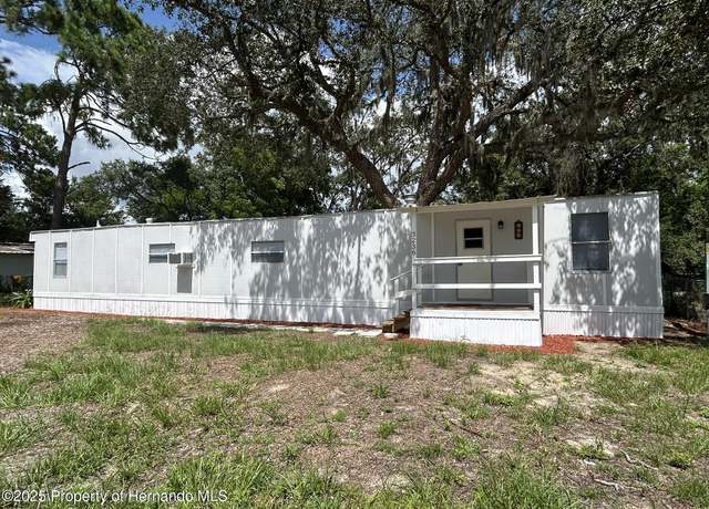 Property at 3236 Painters St, Spring Hill, FL 34606, 3 beds, 2 baths